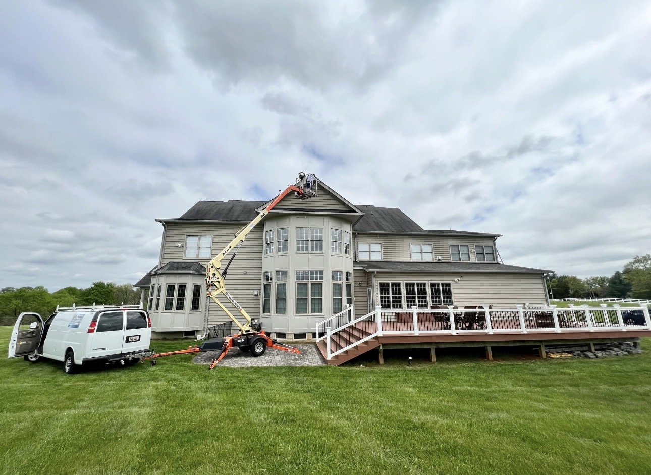 Finished exterior of a large Maryland home completed by City Painting & Renovation